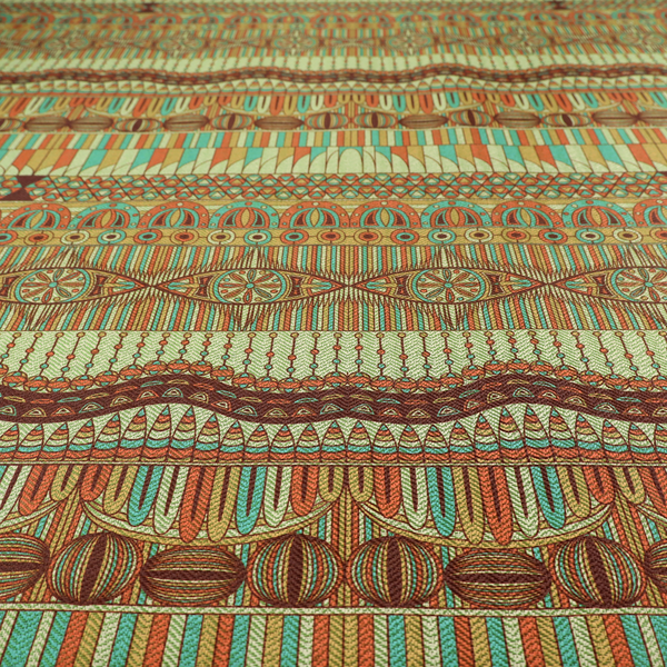 This fabric features intricate, vibrant geometric pattern with horizontal bands in teal, orange, brown, and yellow.