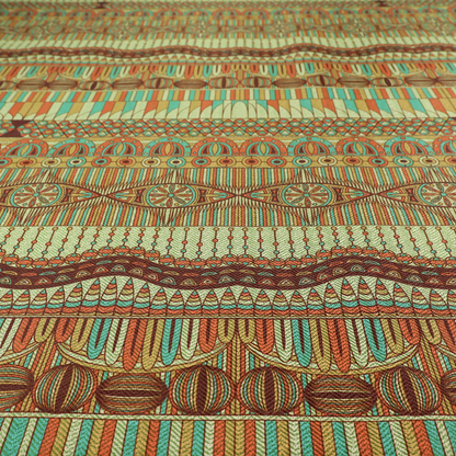 This fabric features intricate, vibrant geometric pattern with horizontal bands in teal, orange, brown, and yellow.
