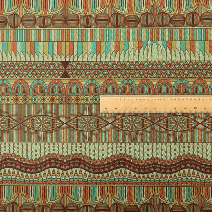 This fabric features intricate, vibrant geometric pattern with horizontal bands in teal, orange, brown, and yellow.