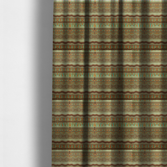 The fabric used to create these made-to-measure curtains features intricate, vibrant geometric pattern with horizontal bands in teal, orange, brown, and yellow.