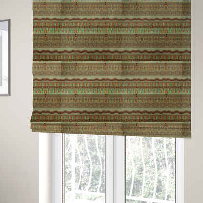 The fabric used to create these Roman blinds features intricate, vibrant geometric pattern with horizontal bands in teal, orange, brown, and yellow.