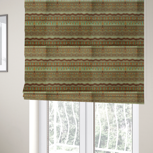 The fabric used to create these Roman blinds features intricate, vibrant geometric pattern with horizontal bands in teal, orange, brown, and yellow.