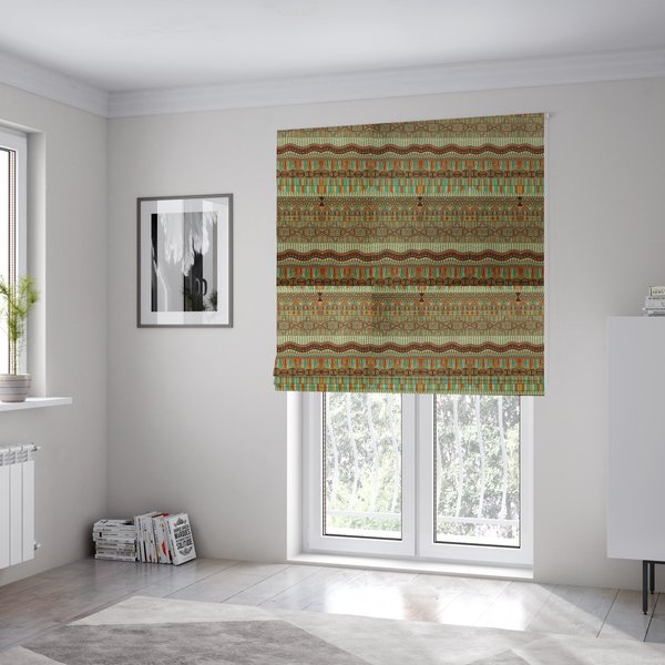 The fabric used to create these Roman blinds features intricate, vibrant geometric pattern with horizontal bands in teal, orange, brown, and yellow.