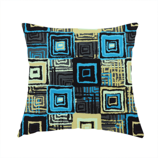 The fabric used to create this handmade cushion is an abstract geometric pattern featuring nested squares in shades of bright blue, pale yellow, dark grey, and black.