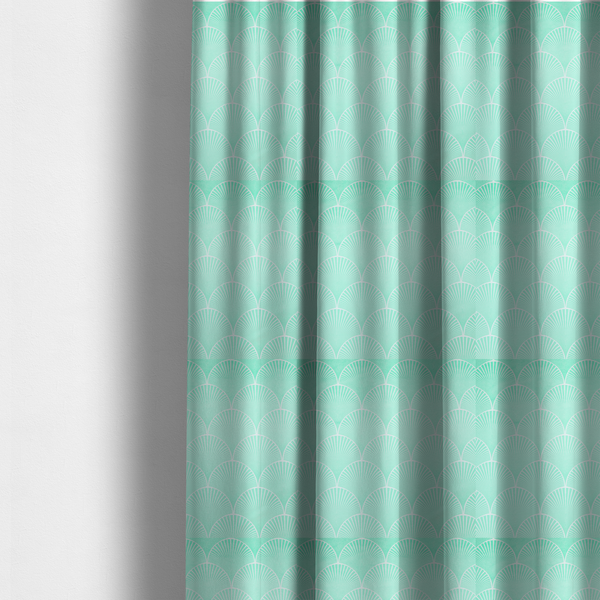 The fabric used to create these made-to-measure curtains is a elegant, repeating Art Deco-inspired fan pattern in a soft mint green and white colour palette.
