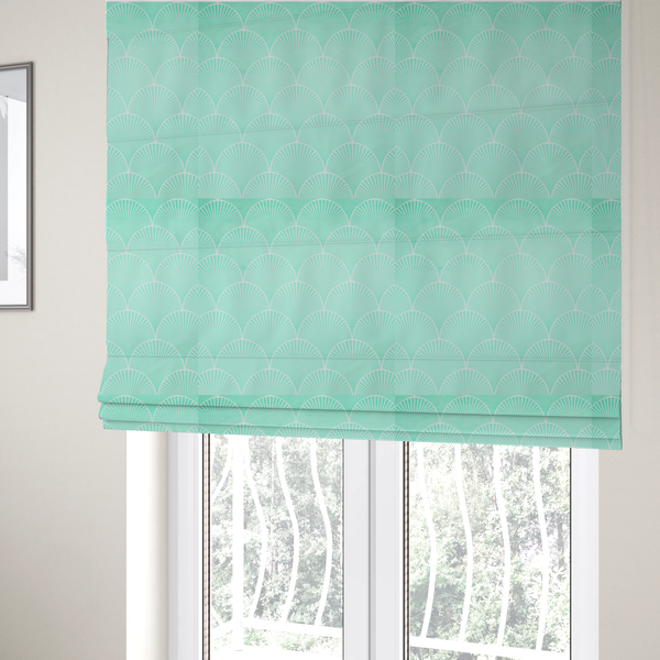 The fabric used to create these Roman blinds is a elegant, repeating Art Deco-inspired fan pattern in a soft mint green and white colour palette.