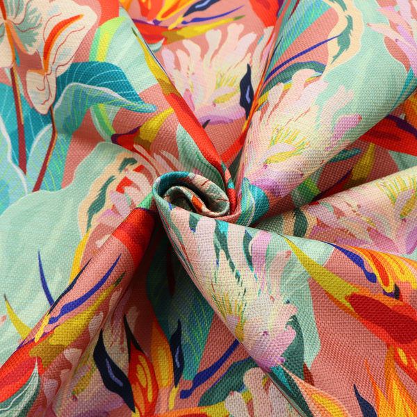 Vibrant repeating botanical pattern featuring tropical flowers, including birds of paradise and white anthuriums, with large green leaves against a dusty pink background.