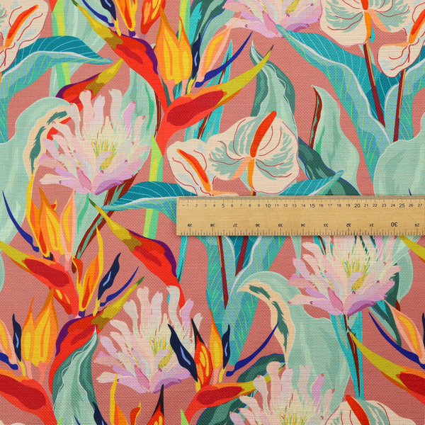 Vibrant repeating botanical pattern featuring tropical flowers, including birds of paradise and white anthuriums, with large green leaves against a dusty pink background.