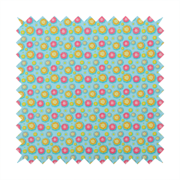 Light blue fabric featuring an all-over repeating pattern of vibrant pink and gold floral motifs interspersed with small yellow dotted accents.