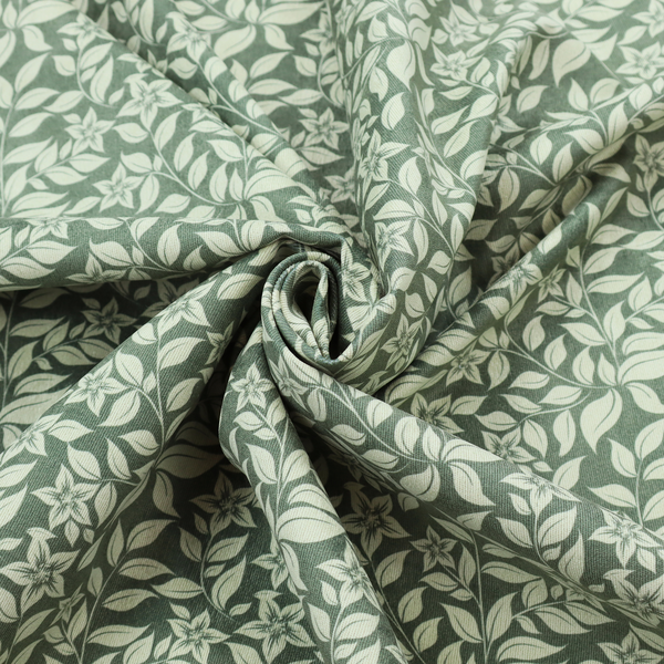 A green fabric featuring an intricate, repeating botanical pattern of trailing vines, leaves, and small white flowers.