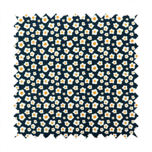 A dark navy blue fabric featuring a dense, repeating pattern of small fried egg motifs with white whites and yellow yolks.