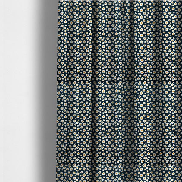 The fabric used to create these made-to-measure curtains is a dark navy blue fabric featuring a dense, repeating pattern of small fried egg motifs with white whites and yellow yolks.