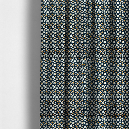 The fabric used to create these made-to-measure curtains is a dark navy blue fabric featuring a dense, repeating pattern of small fried egg motifs with white whites and yellow yolks.