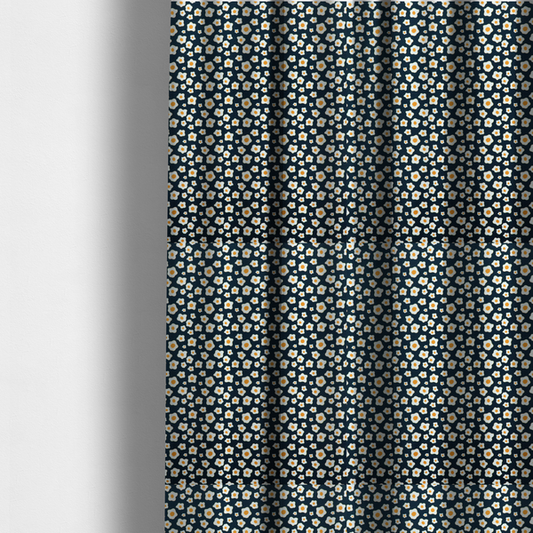 The fabric used to create these made-to-measure curtains is a dark navy blue fabric featuring a dense, repeating pattern of small fried egg motifs with white whites and yellow yolks.