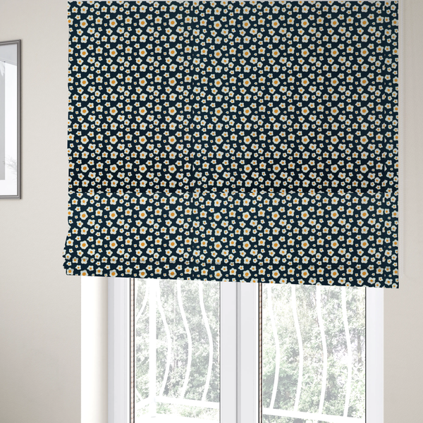 The fabric used to create these Roman blinds is a dark navy blue fabric featuring a dense, repeating pattern of small fried egg motifs with white whites and yellow yolks.