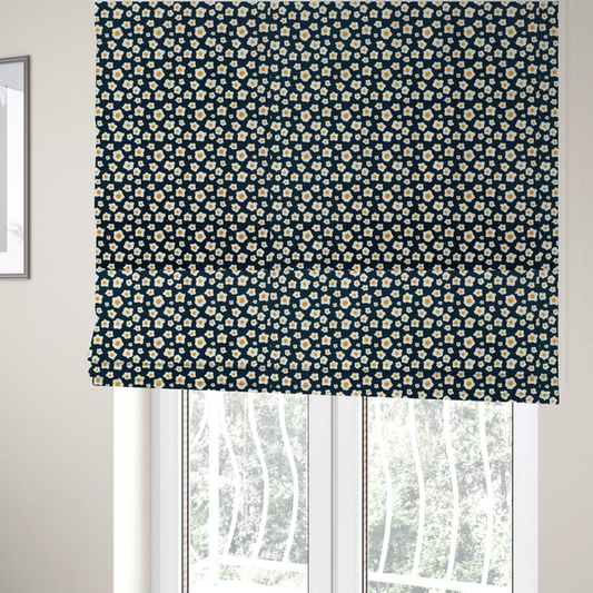 The fabric used to create these Roman blinds is a dark navy blue fabric featuring a dense, repeating pattern of small fried egg motifs with white whites and yellow yolks.