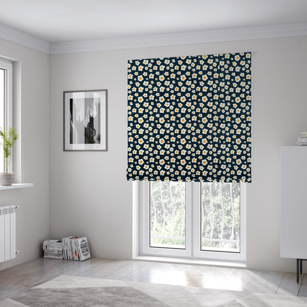 The fabric used to create these Roman blinds is a dark navy blue fabric featuring a dense, repeating pattern of small fried egg motifs with white whites and yellow yolks.