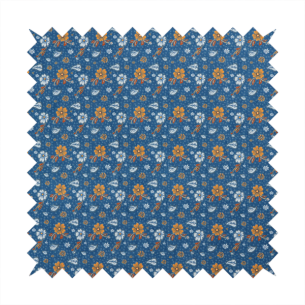 A royal blue fabric featuring a detailed, repeating pattern of orange and white flowers, small leaves, and sprigs