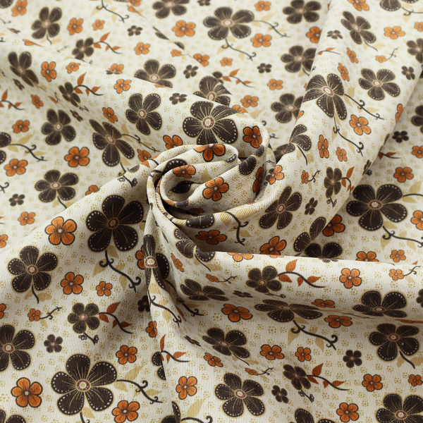 A light cream fabric featuring a repeating retro pattern of dark brown and orange flowers with scrolling vines.