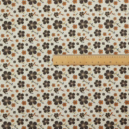 A light cream fabric featuring a repeating retro pattern of dark brown and orange flowers with scrolling vines.