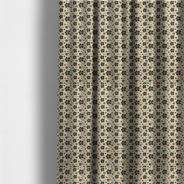 The fabric used to create these made-to-measure curtains is a light cream fabric featuring a repeating retro pattern of dark brown and orange flowers with scrolling vines.