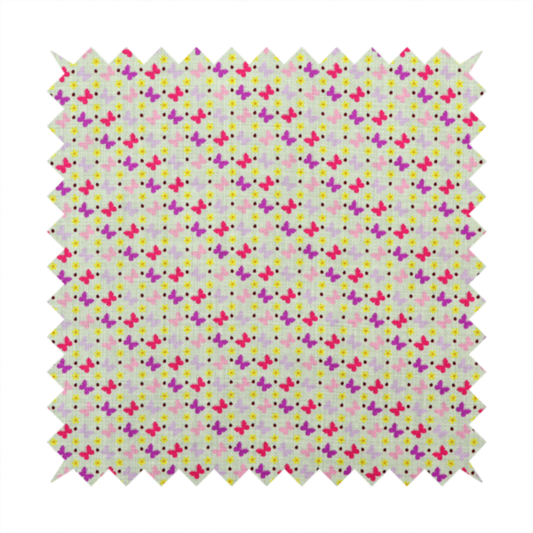 A light green fabric featuring a dense, repeating pattern of small multi-coloured butterflies in pink, magenta, and purple, interspersed with tiny yellow flowers and dots.