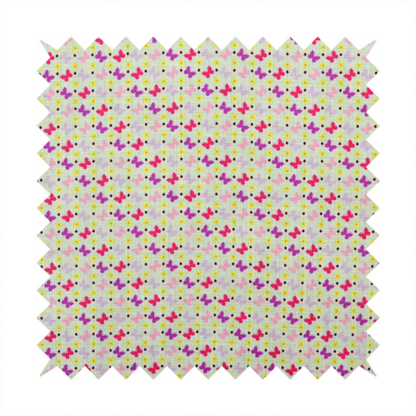 A light green fabric featuring a dense, repeating pattern of small multi-coloured butterflies in pink, magenta, and purple, interspersed with tiny yellow flowers and dots.