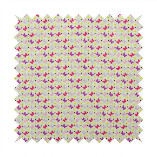 A light green fabric featuring a dense, repeating pattern of small multi-coloured butterflies in pink, magenta, and purple, interspersed with tiny yellow flowers and dots.