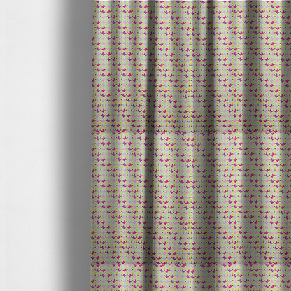 The fabric used to create these made-to-measure curtains is a light green fabric featuring a dense, repeating pattern of small multi-coloured butterflies in pink, magenta, and purple, interspersed with tiny yellow flowers and dots.