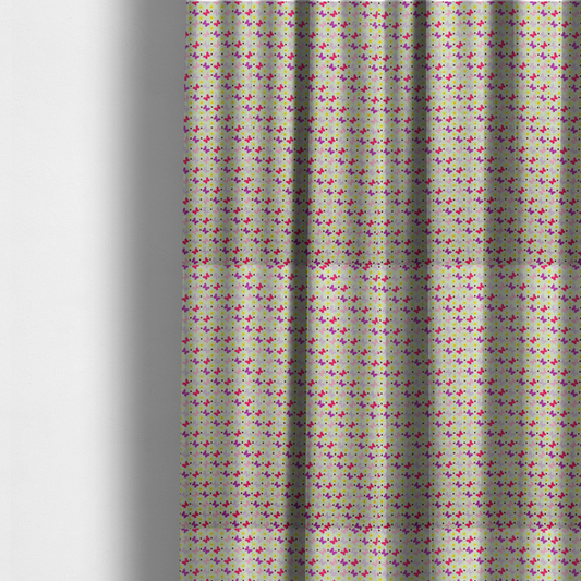 The fabric used to create these made-to-measure curtains is a light green fabric featuring a dense, repeating pattern of small multi-coloured butterflies in pink, magenta, and purple, interspersed with tiny yellow flowers and dots.