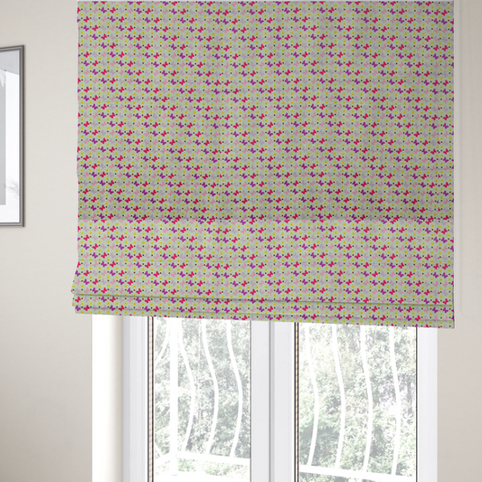 The fabric used to create these roman blinds is a light green fabric featuring a dense, repeating pattern of small multi-coloured butterflies in pink, magenta, and purple, interspersed with tiny yellow flowers and dots.