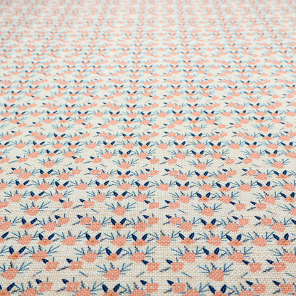 An off-white fabric featuring a neat, repeating geometric pattern of small peach-pink flowers and dark blue leafy sprigs.