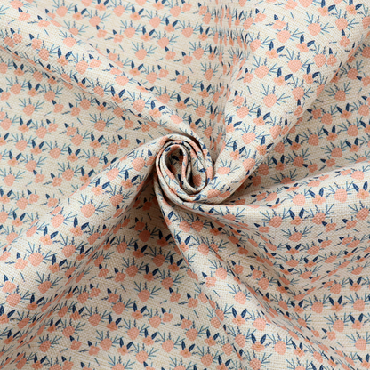 An off-white fabric featuring a neat, repeating geometric pattern of small peach-pink flowers and dark blue leafy sprigs.
