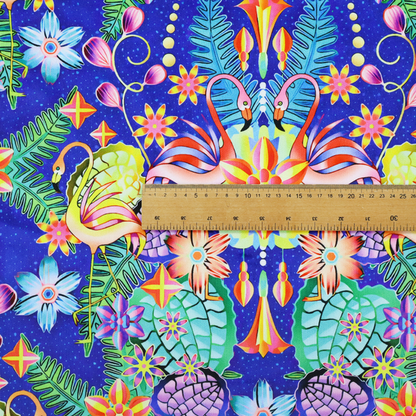This fabric features an intricate, psychedelic-inspired tropical print with a rich, dark blue background.