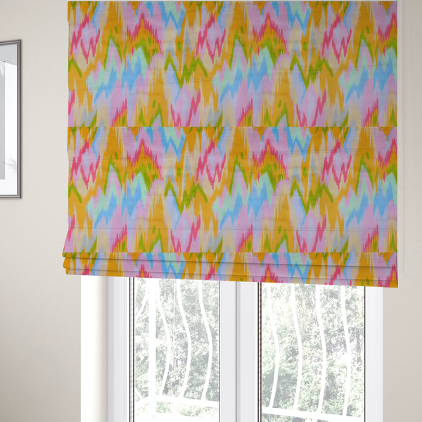 The fabric used to create these Roman blinds is a fabric features a vibrant, multi-coloured ikat-style pattern with a soft, blurred aesthetic. 
