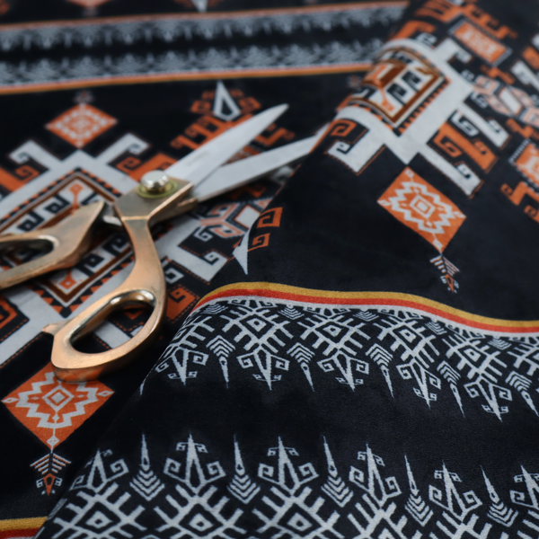 This fabric features a striking, traditional-style geometric pattern reminiscent of Southeast Asian ethnic textiles (such as Thai or Laotian silk motifs).