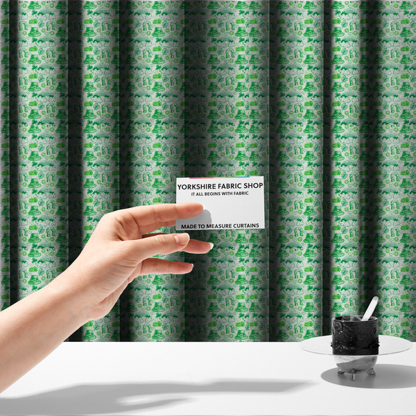 The fabric used to create these made-to-measure curtains is a seamless St. Patrick’s Day fabric pattern featuring hand-sketched green icons including leprechaun top hats, lucky horseshoes, rainbows over clouds, four-leaf clovers, and small gold coins on a white textured background.