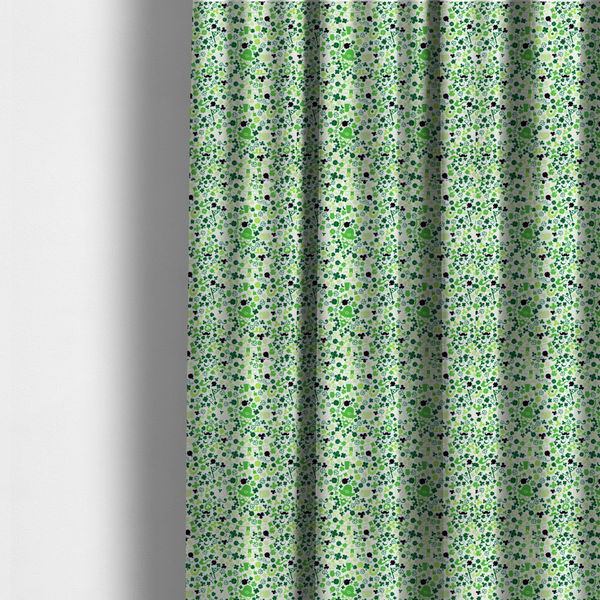 The fabric used to create these made-to-measure curtains is a seamless St. Patrick’s Day fabric pattern on a white background featuring green party bunting banners, frothy beer mugs, leprechaun hats with sunglasses, pipes, horseshoes, and black and green shamrocks.