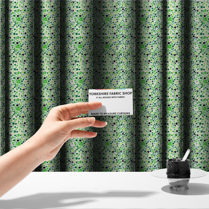 The fabric used to create these made-to-measure curtains is a seamless St. Patrick’s Day fabric pattern on a white background featuring green party bunting banners, frothy beer mugs, leprechaun hats with sunglasses, pipes, horseshoes, and black and green shamrocks.