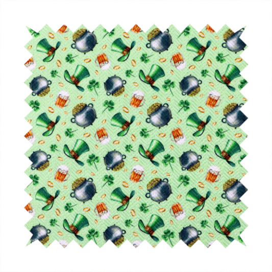High-detail St. Patrick's Day fabric pattern on a light green textured background. The print features iron cauldrons overflowing with gold coins, frothy beer mugs, green leprechaun top hats with gold buckles, and scattered four-leaf clovers.