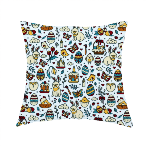 The fabric used to create these handmade cushions  features a whimsical, hand-drawn Easter doodle pattern set against a clean, pale blue-grey background. The design is a dense, "scatter" style print using a primary colour palette of deep red, mustard yellow, and teal blue.