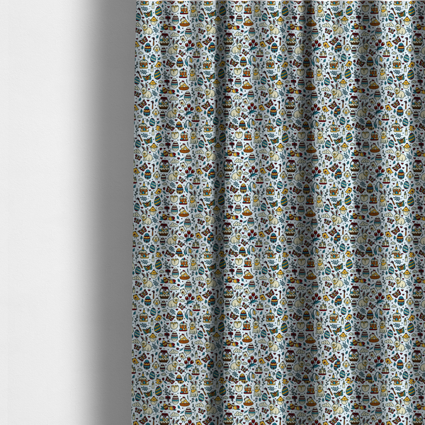 The fabric used to create these made-to-measure curtains features a whimsical, hand-drawn Easter doodle pattern set against a clean, pale blue-grey background. The design is a dense, "scatter" style print using a primary colour palette of deep red, mustard yellow, and teal blue.
