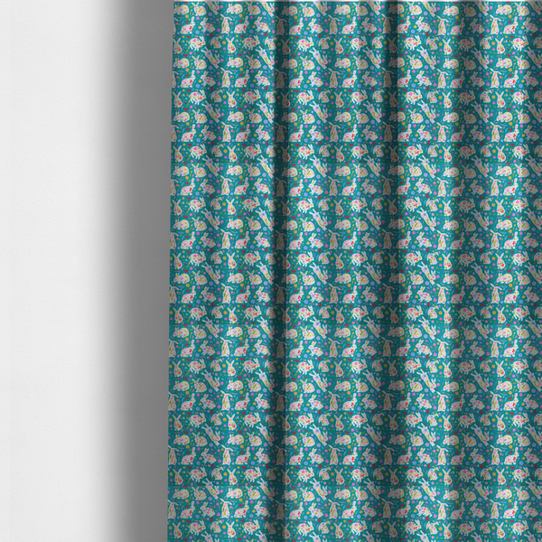 The fabric used to create these made-to-measure curtains features a vibrant, folk-art inspired Easter pattern set against a rich teal-green background. The design is characterized by its high-contrast colour palette and intricate floral silhouettes.