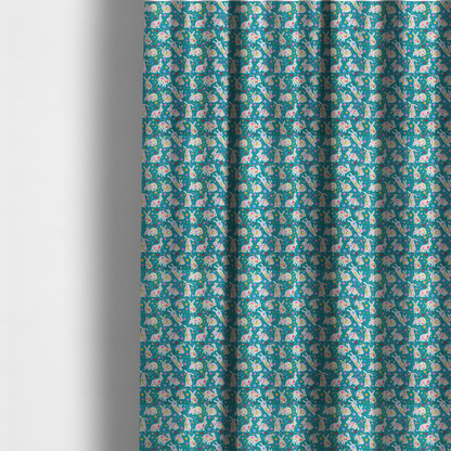 The fabric used to create these made-to-measure curtains features a vibrant, folk-art inspired Easter pattern set against a rich teal-green background. The design is characterized by its high-contrast colour palette and intricate floral silhouettes.