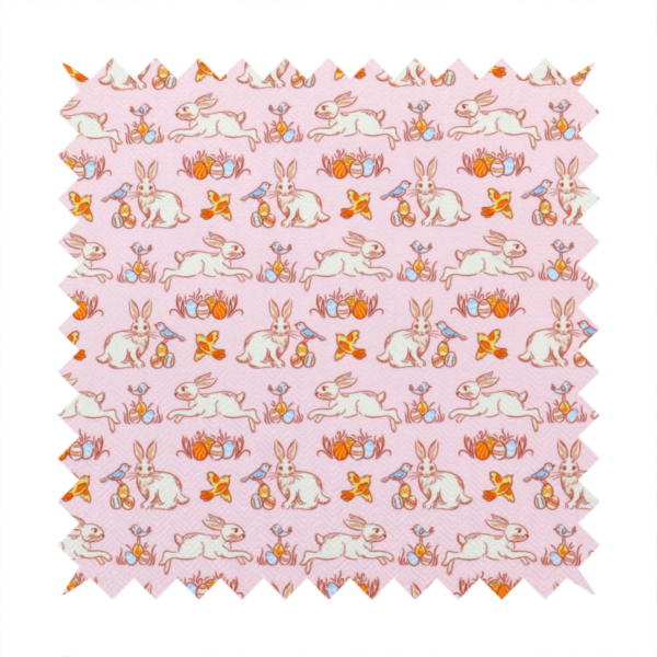 This fabric features a vintage-style Easter meadow pattern on a soft, blush-pink background. The design is reminiscent of classic children’s book illustrations, using fine, orange-brown linework and a muted pastel palette.
