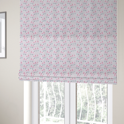 The fabric used to create these Roman blinds features a modern, minimalist bunny pattern set against a soft, pale pink background. The design is clean and contemporary, focusing on a repeating motif of stylized rabbit faces.
