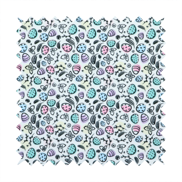This fabric features an artistic, hand-illustrated Easter egg pattern on a cool, pale blue background. The design has a sketchbook or "doodle" quality, with expressive black ink outlines and soft watercolour-style colour accents.