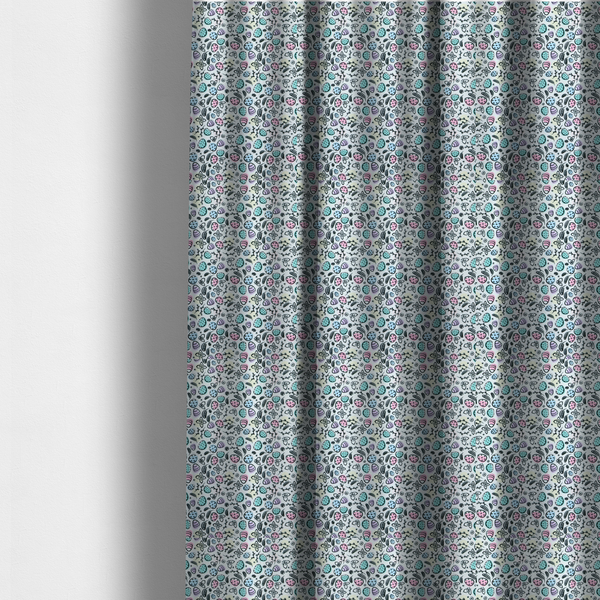 The fabric used to create these made-to-measure curtains features an artistic, hand-illustrated Easter egg pattern on a cool, pale blue background. The design has a sketchbook or "doodle" quality, with expressive black ink outlines and soft watercolour-style colour accents.