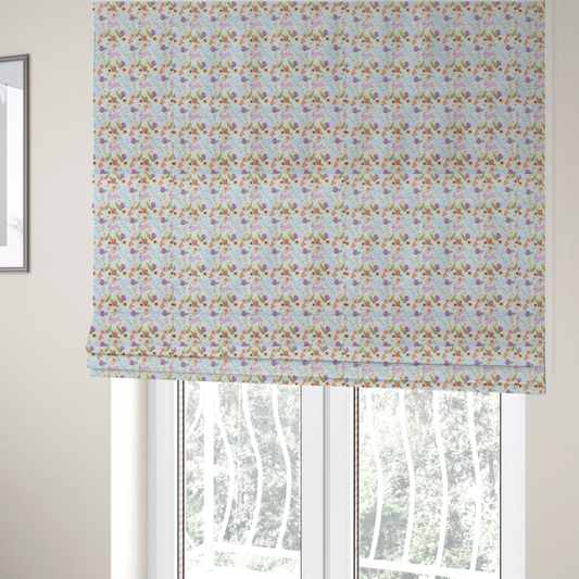 The fabric used to create these Roman blinds features a sweet, pastoral Easter pattern on a crisp, white background. The design has a classic, gentle feel, combining soft pastel illustrations with delicate floral arrangements.
