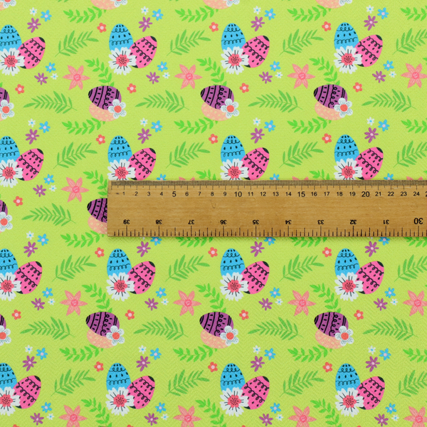 This fabric features a vibrant and modern Easter floral pattern set against a bright lime-green background. The design has a high-energy, "pop-art" feel with bold colours and playful, hand-drawn textures.